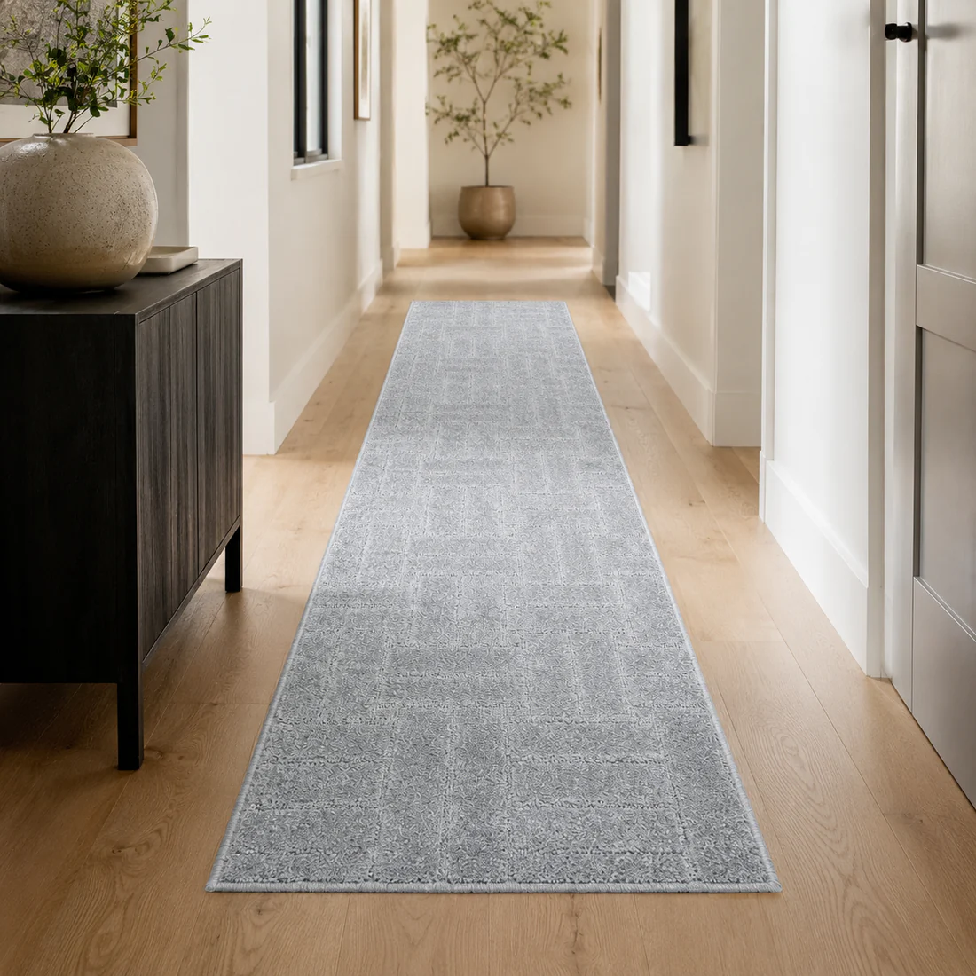 Serenity Soft Parquet Silver runner styled in a bright hallway
